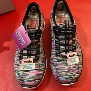 Sketchers slip on sneakers. New in box